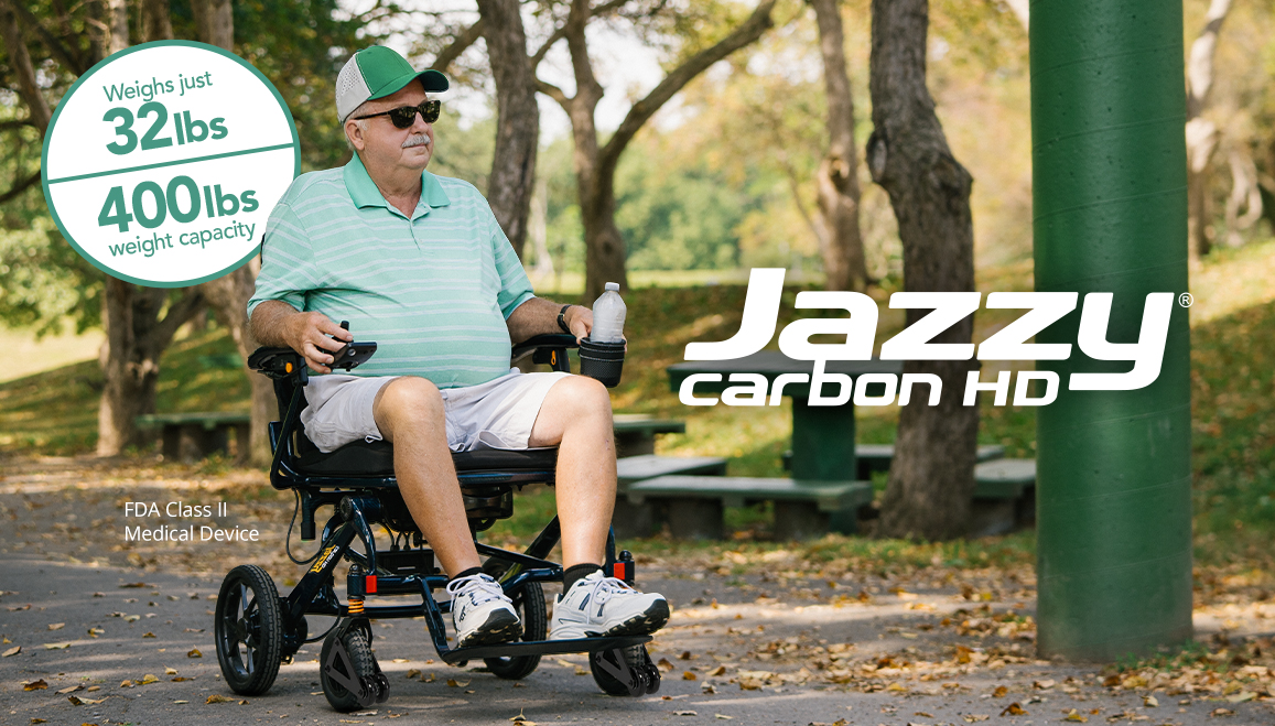 An active adult enjoying a park outing with the Jazzy Carbon HD